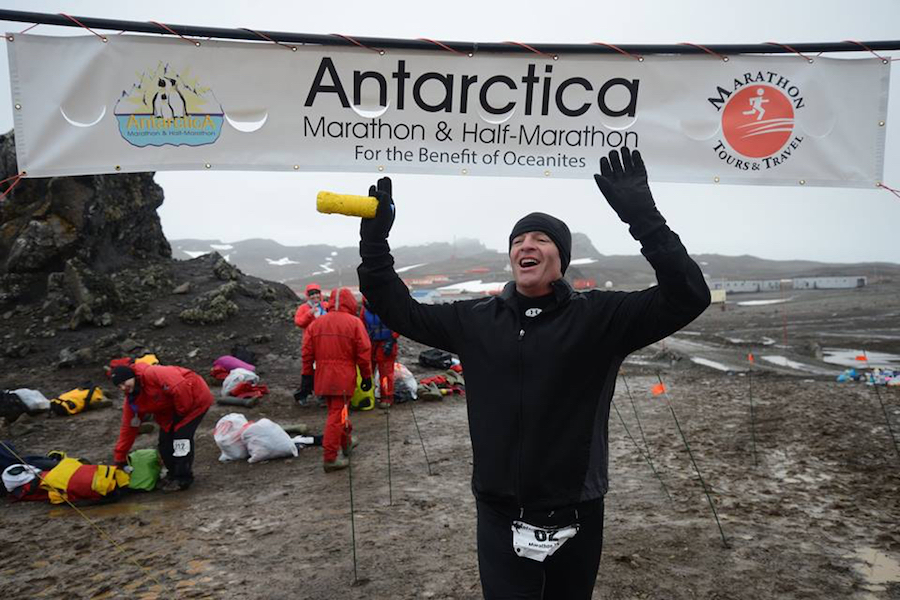 Photo of Mike Messerschmidt running in a marathon in Antarctica.